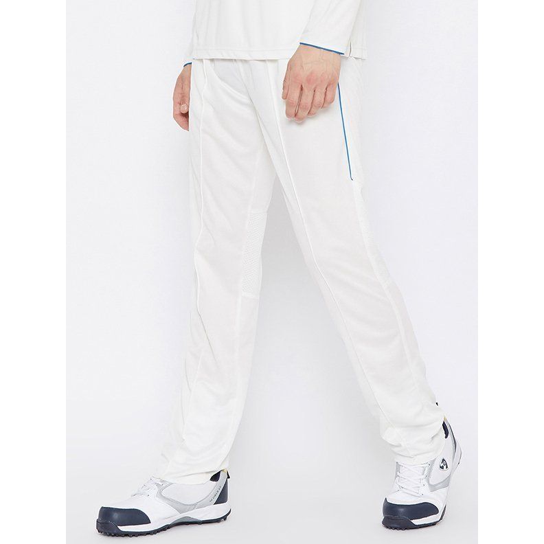Men CRICKET TAPER FIT TRACKPANTS TP 500 TURQUOISE